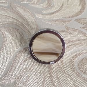 Silver and beige statement ring.